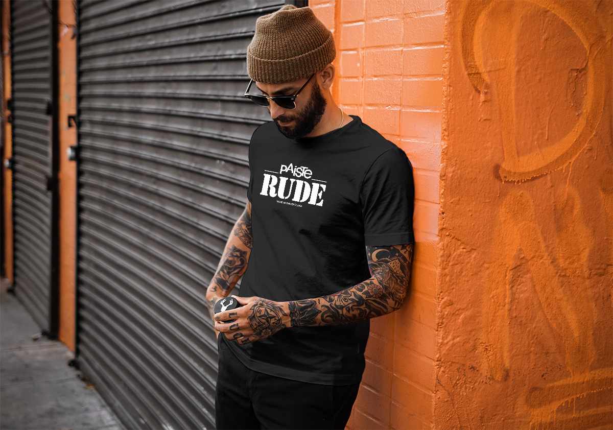 Man wearing black Paiste RUDE T-shirt